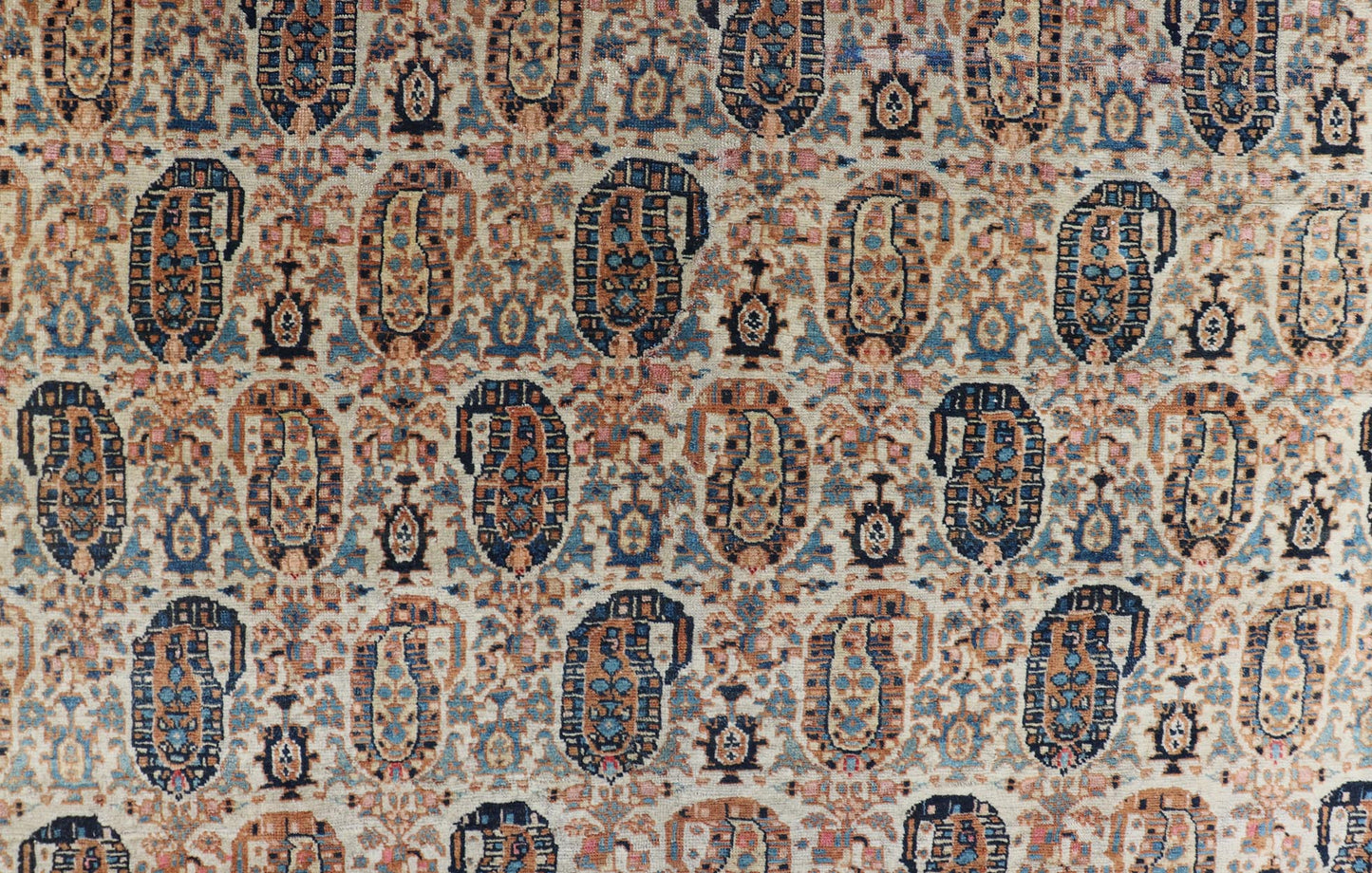 Antique Faraghan Persian Rug in Cream Color Background With Paisley's With Blue. Keivan Woven Arts / Rug / X23 - 0401 - 154, Faraghan Antique Faraghan, Antique Sarouk. Measures: 8'6 x 13'3 This exquisite antique Faraghan fine Persian rug displays a ... - Keivan Woven ArtsX23 - 0401 - 154 - 24259Rugs