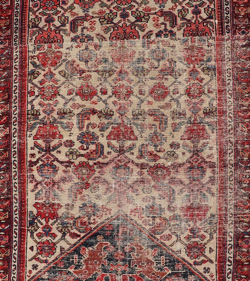Antique Persian Long Hamedan Runner With Medallions in Ivory and Maroon. Keivan Woven Arts / rug X23 - 0402 - 180, country of origin / type: Iran / Hamadan, circa 1910 Measures: 3'5 x 26'4 This antique Persian hamadan runner, from western Persia, or... - Keivan Woven ArtsX23 - 0402 - 180 - 24265Rug