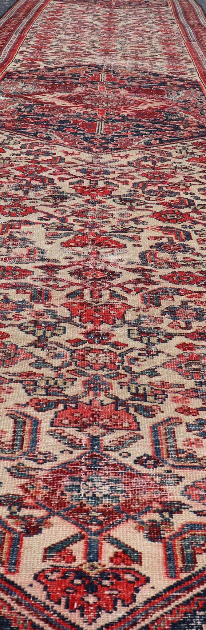 Antique Persian Long Hamedan Runner With Medallions in Ivory and Maroon. Keivan Woven Arts / rug X23 - 0402 - 180, country of origin / type: Iran / Hamadan, circa 1910 Measures: 3'5 x 26'4 This antique Persian hamadan runner, from western Persia, or... - Keivan Woven ArtsX23 - 0402 - 180 - 24265Rug
