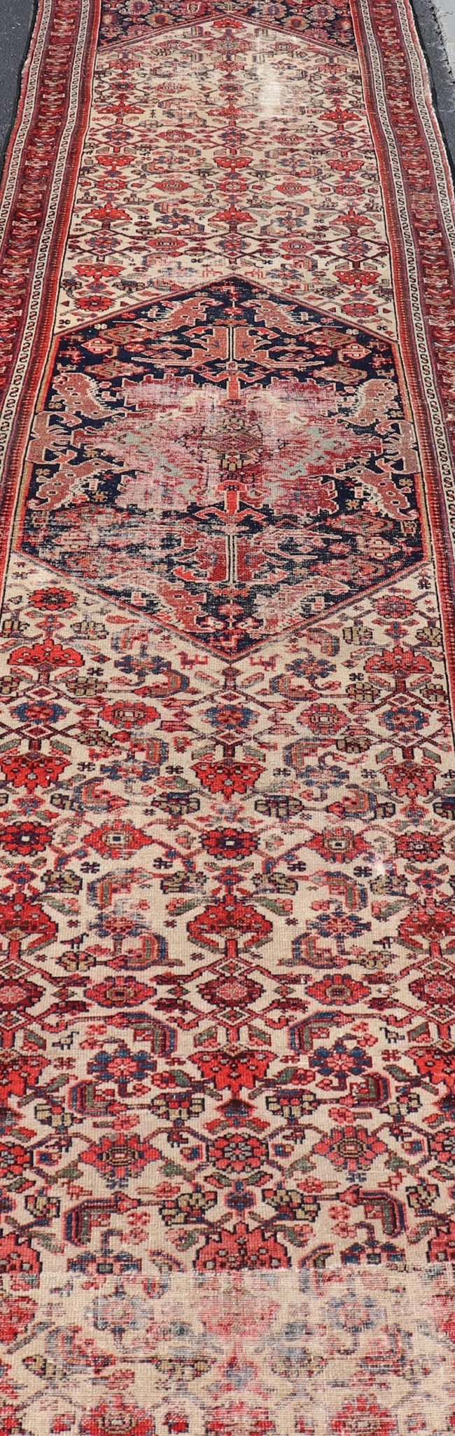 Antique Persian Long Hamedan Runner With Medallions in Ivory and Maroon. Keivan Woven Arts / rug X23 - 0402 - 180, country of origin / type: Iran / Hamadan, circa 1910 Measures: 3'5 x 26'4 This antique Persian hamadan runner, from western Persia, or... - Keivan Woven ArtsX23 - 0402 - 180 - 24265Rug