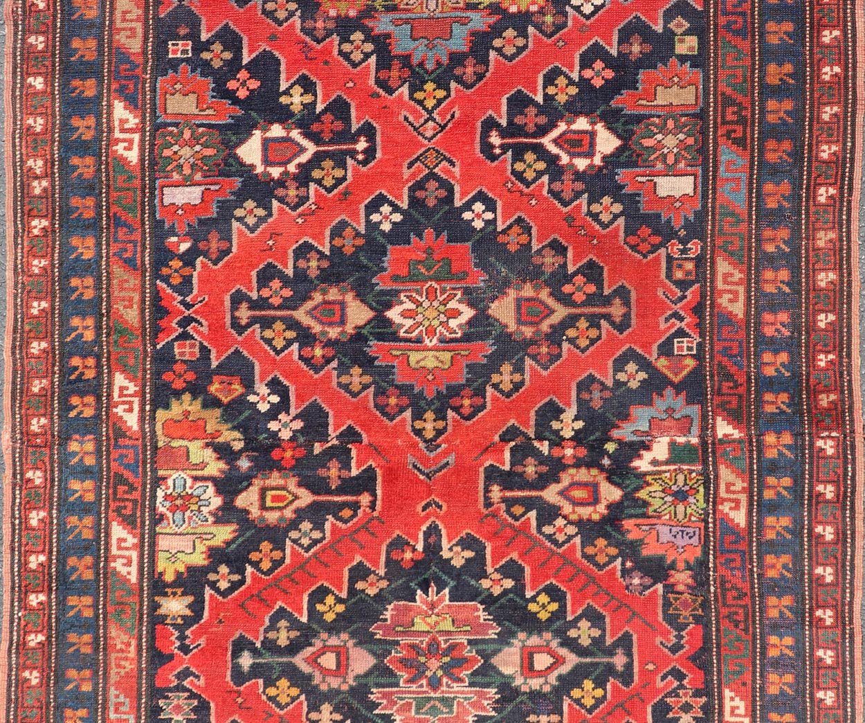 Antique Caucasian Kazak Rug with Sub - Geometric Medallions Design in Red and Blue. Keivan Woven Arts / rug X23 - 0405 - 259, country of origin / type: Caucasus / Kazak, circa Late - 19th Century. Antique Caucasian Kazak Rug with Sub - Geometric Medallions Desig... - Keivan Woven ArtsX23 - 0405 - 259 - 24283Rug