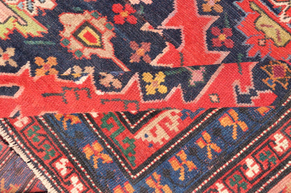 Antique Caucasian Kazak Rug with Sub - Geometric Medallions Design in Red and Blue. Keivan Woven Arts / rug X23 - 0405 - 259, country of origin / type: Caucasus / Kazak, circa Late - 19th Century. Antique Caucasian Kazak Rug with Sub - Geometric Medallions Desig... - Keivan Woven ArtsX23 - 0405 - 259 - 24283Rug