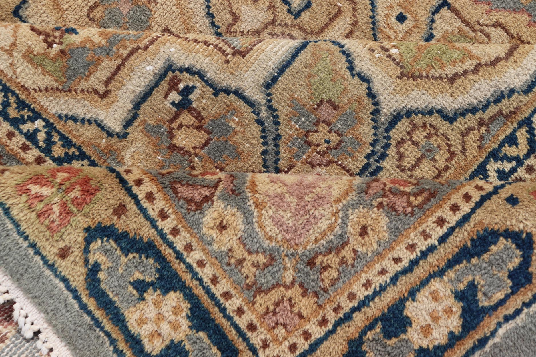 Medallion Vintage Turkish Distressed Rug in Cream, Gray - Blue, Taupe, and Green. Keivan Woven Arts / rug X23 - 0406 - 914, country of origin / type: Turkey / Oushak, circa 1970. Measures: 10'0 x 14'0 This distressed rug Turkish vintage rug bears a li... - Keivan Woven ArtsX23 - 0406 - 914 - 24223Rug