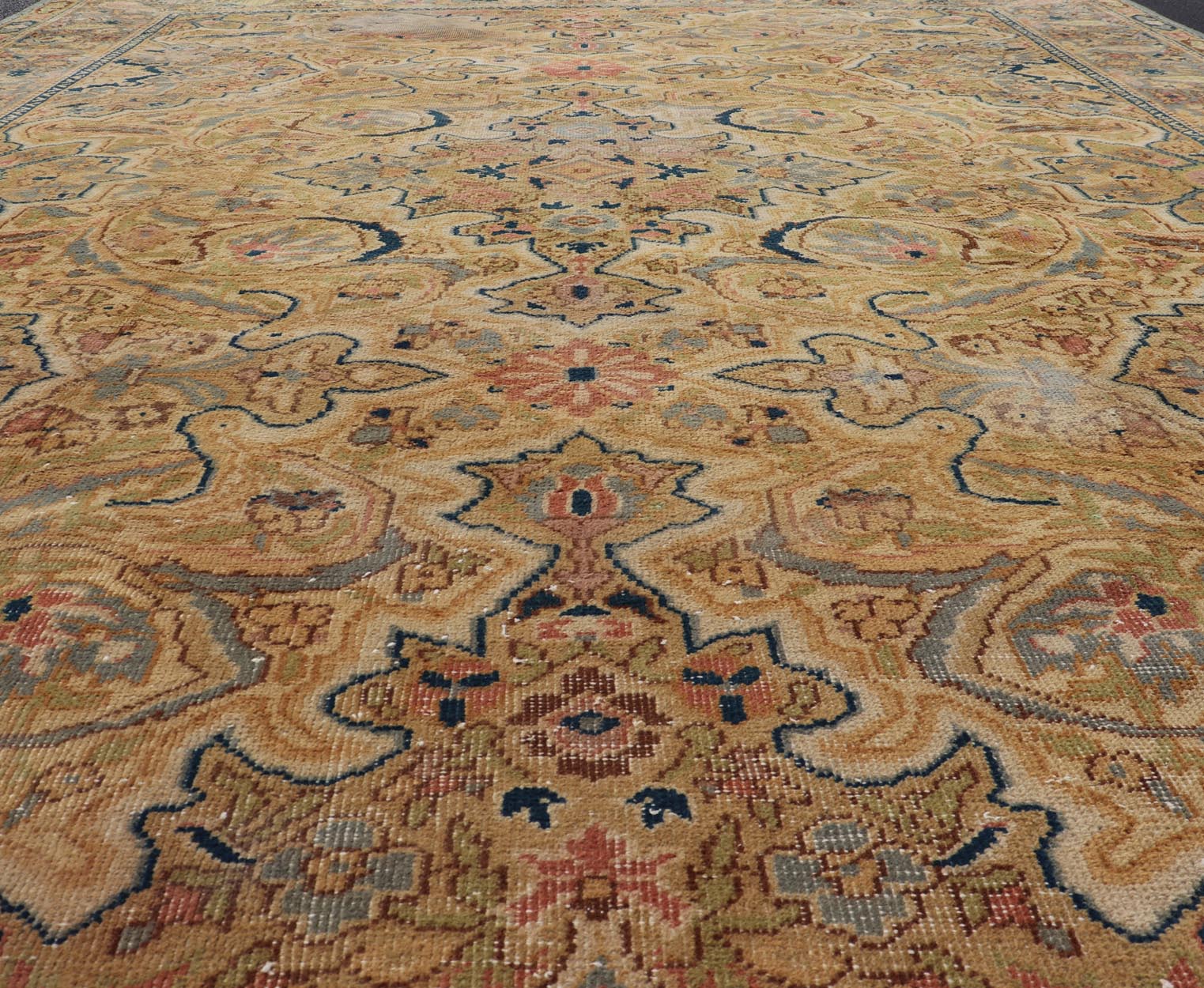 Medallion Vintage Turkish Distressed Rug in Cream, Gray - Blue, Taupe, and Green. Keivan Woven Arts / rug X23 - 0406 - 914, country of origin / type: Turkey / Oushak, circa 1970. Measures: 10'0 x 14'0 This distressed rug Turkish vintage rug bears a li... - Keivan Woven ArtsX23 - 0406 - 914 - 24223Rug