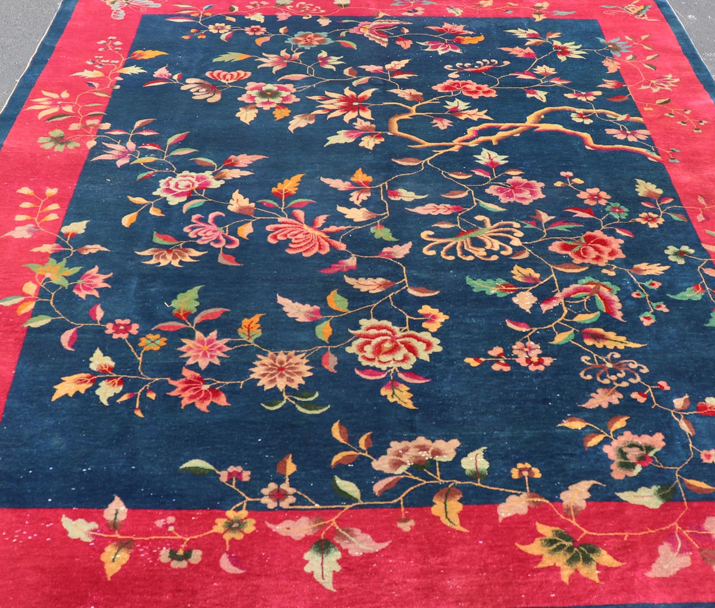 Blue Background Chinese Art Deco Rug with Large Vining Flowers and Leaves. Keivan Woven Arts / rug X23 - 0603, country of origin / type: China / Art Deco, circa 1920. Measures: 9'0 x 11'4 Alive with color, this beautiful antique Art Deco Chinese r... - Keivan Woven ArtsX23 - 0603 - 24486Rug