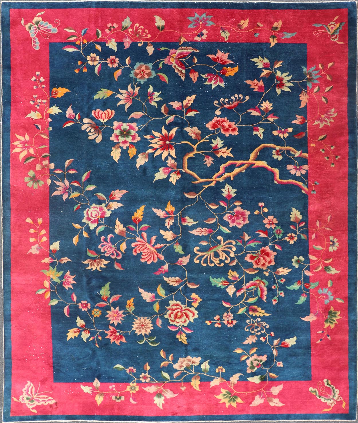 Blue Background Chinese Art Deco Rug with Large Vining Flowers and Leaves. Keivan Woven Arts / rug X23 - 0603, country of origin / type: China / Art Deco, circa 1920. Measures: 9'0 x 11'4 Alive with color, this beautiful antique Art Deco Chinese r... - Keivan Woven ArtsX23 - 0603 - 24486Rug