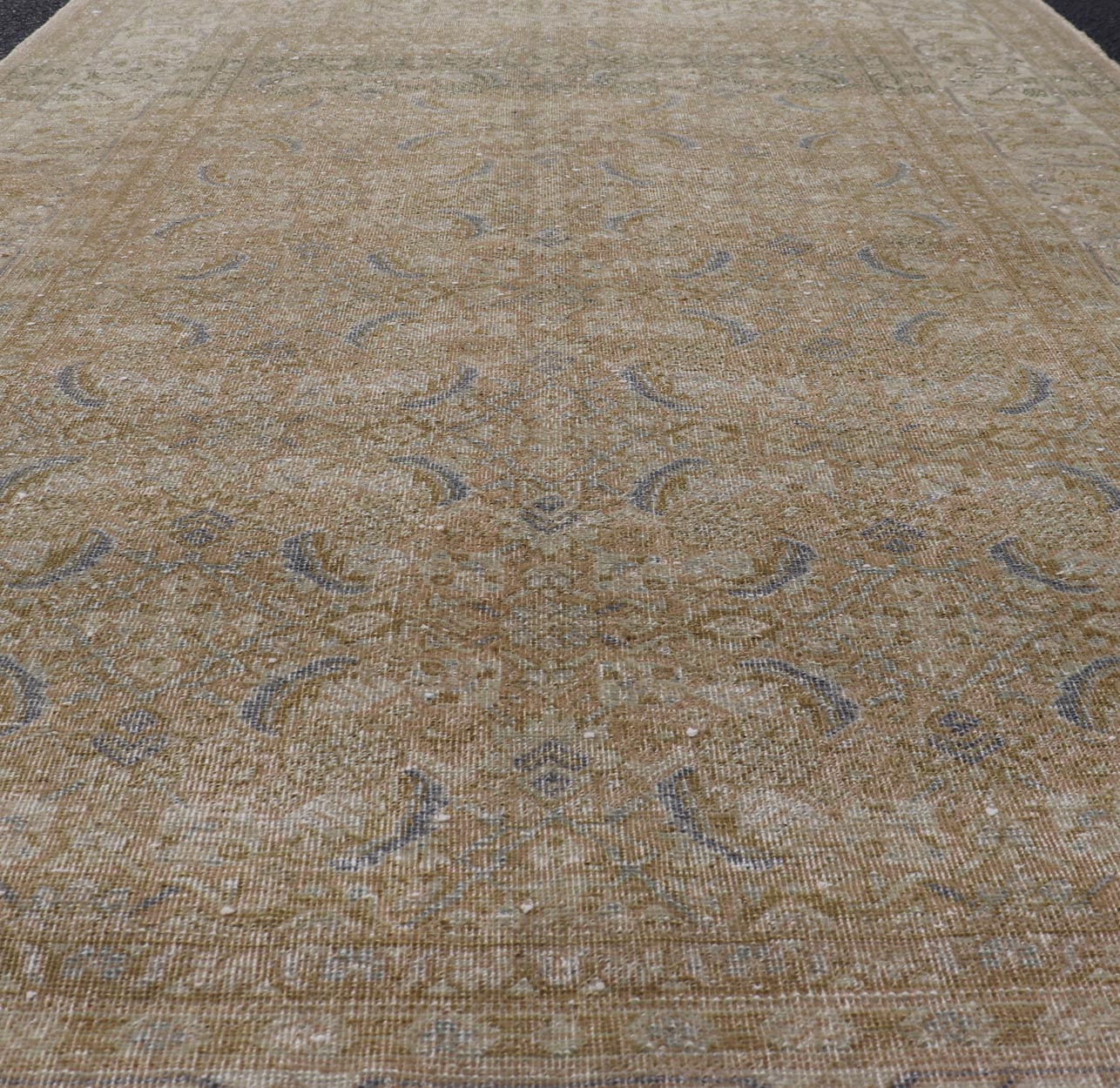Antique Persian Tabriz Rug in Wool with Floral Design in Blue, Tan, Taupe, Cream. Keivan Woven Arts / rug X23 - 0604, country of origin / type: Iran / Tabriz, circa 1930s. Measures: 4'10 x 7'0 This Tabriz rug features a intricate and detailed bord... - Keivan Woven ArtsX23 - 0604 - 24492Rug