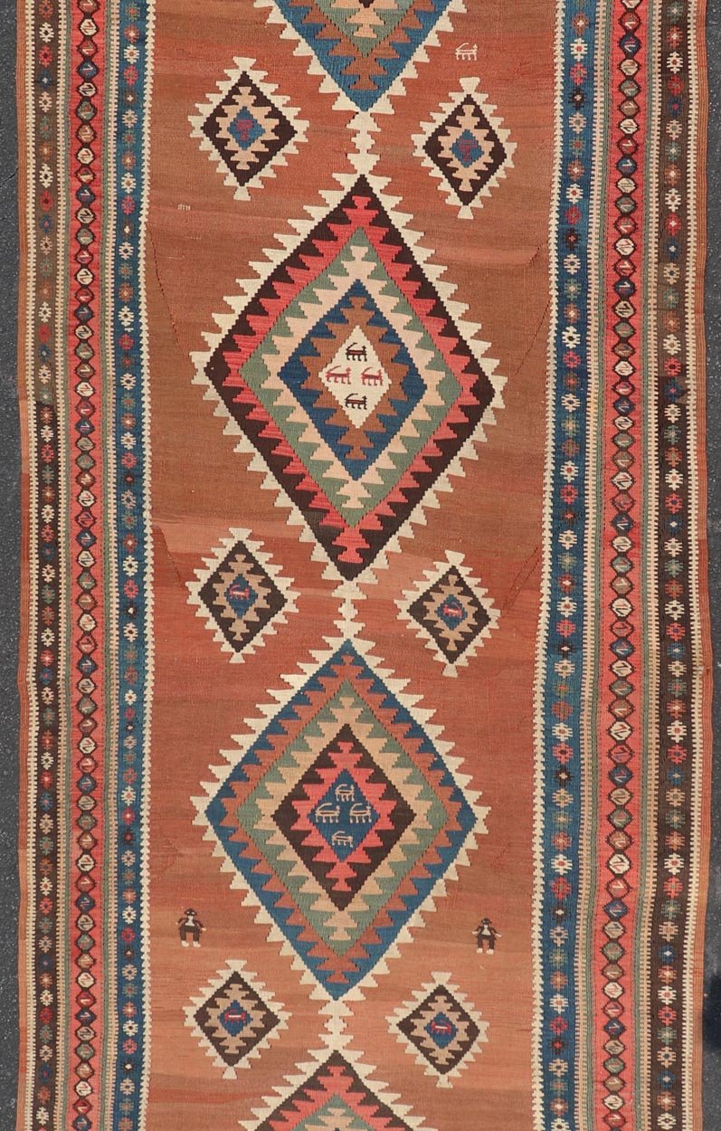 Antique Persian Kurdish Kilim Gallery Runner with Geometric Medallion Design. Keivan Woven Arts / rug X23 - 0610 - 1876, country of origin / type: Iran / Kilim, circa 1910 Measures: 4'11 x 14'3 Featuring an all - over geometric diamond medalli... - Keivan Woven ArtsX23 - 0610 - 1876 - 24511Rug