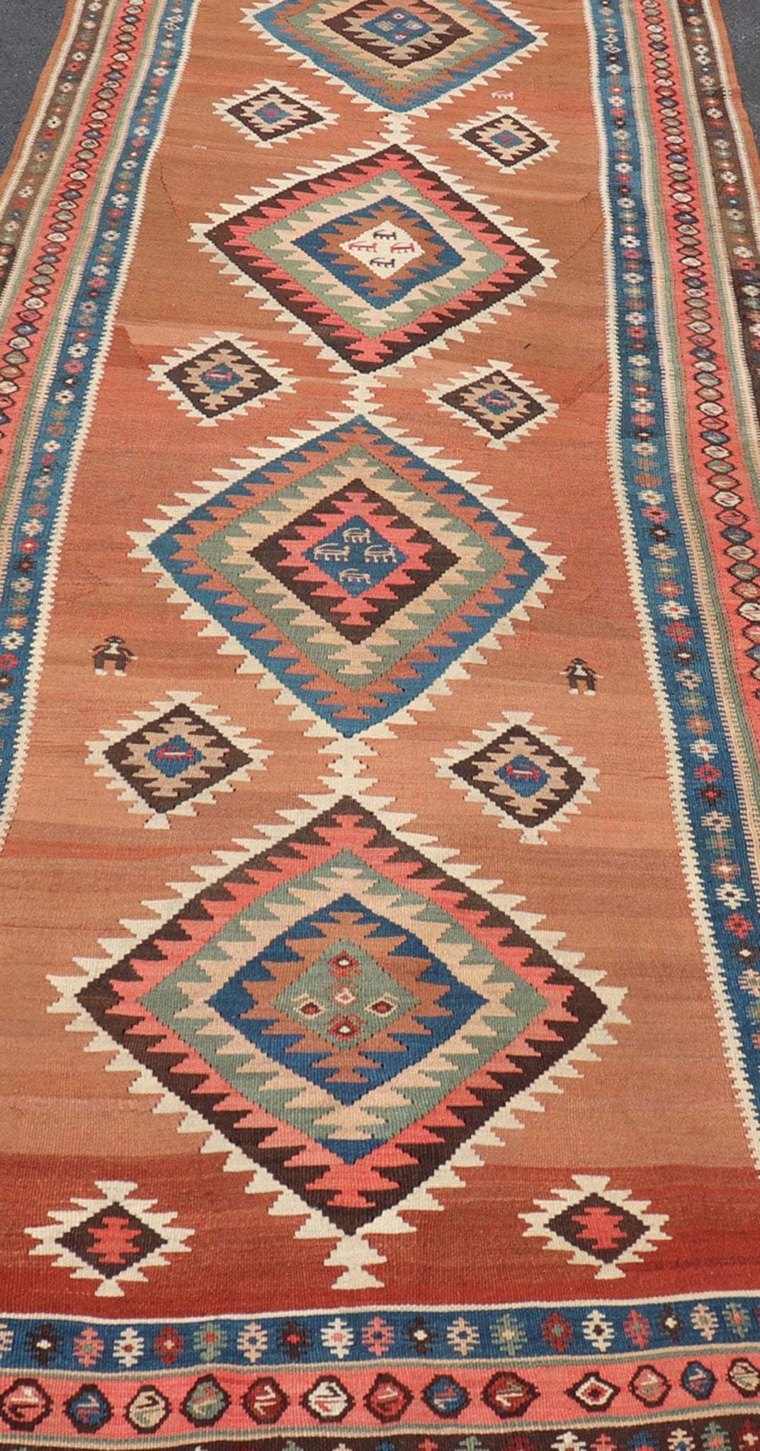 Antique Persian Kurdish Kilim Gallery Runner with Geometric Medallion Design. Keivan Woven Arts / rug X23 - 0610 - 1876, country of origin / type: Iran / Kilim, circa 1910 Measures: 4'11 x 14'3 Featuring an all - over geometric diamond medalli... - Keivan Woven ArtsX23 - 0610 - 1876 - 24511Rug