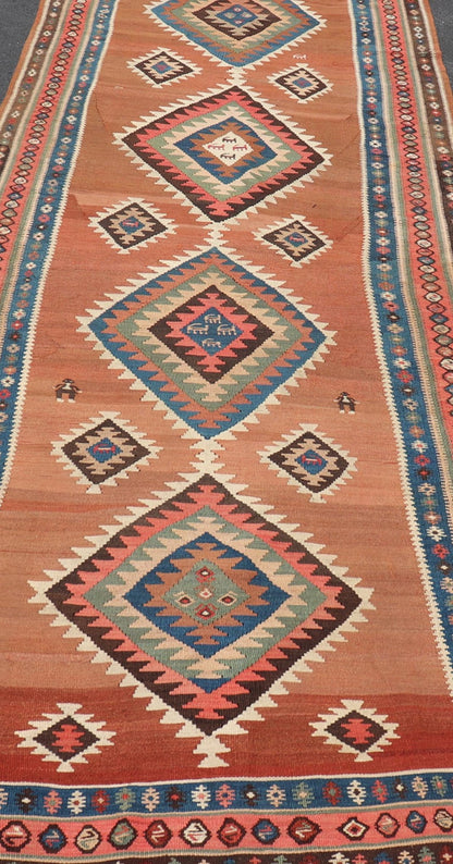 Antique Persian Kurdish Kilim Gallery Runner with Geometric Medallion Design. Keivan Woven Arts / rug X23 - 0610 - 1876, country of origin / type: Iran / Kilim, circa 1910 Measures: 4'11 x 14'3 Featuring an all - over geometric diamond medalli... - Keivan Woven ArtsX23 - 0610 - 1876 - 24511Rug