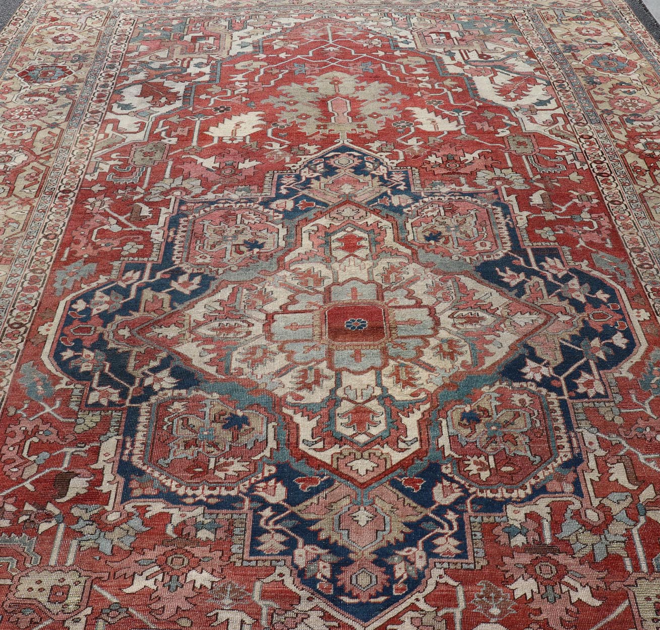 Large Antique Persian Serapi With Geometric Medallion Design With Red and Tan. Keivan Woven Arts / Rug / X23 - 0705 / country of origin / type: Iran /Serapi, circa 1890's. Measures: 11'8 x 18'8 Made in the late 19th century, this charming Serapi ... - Keivan Woven ArtsX23 - 0705 - 2714Rug