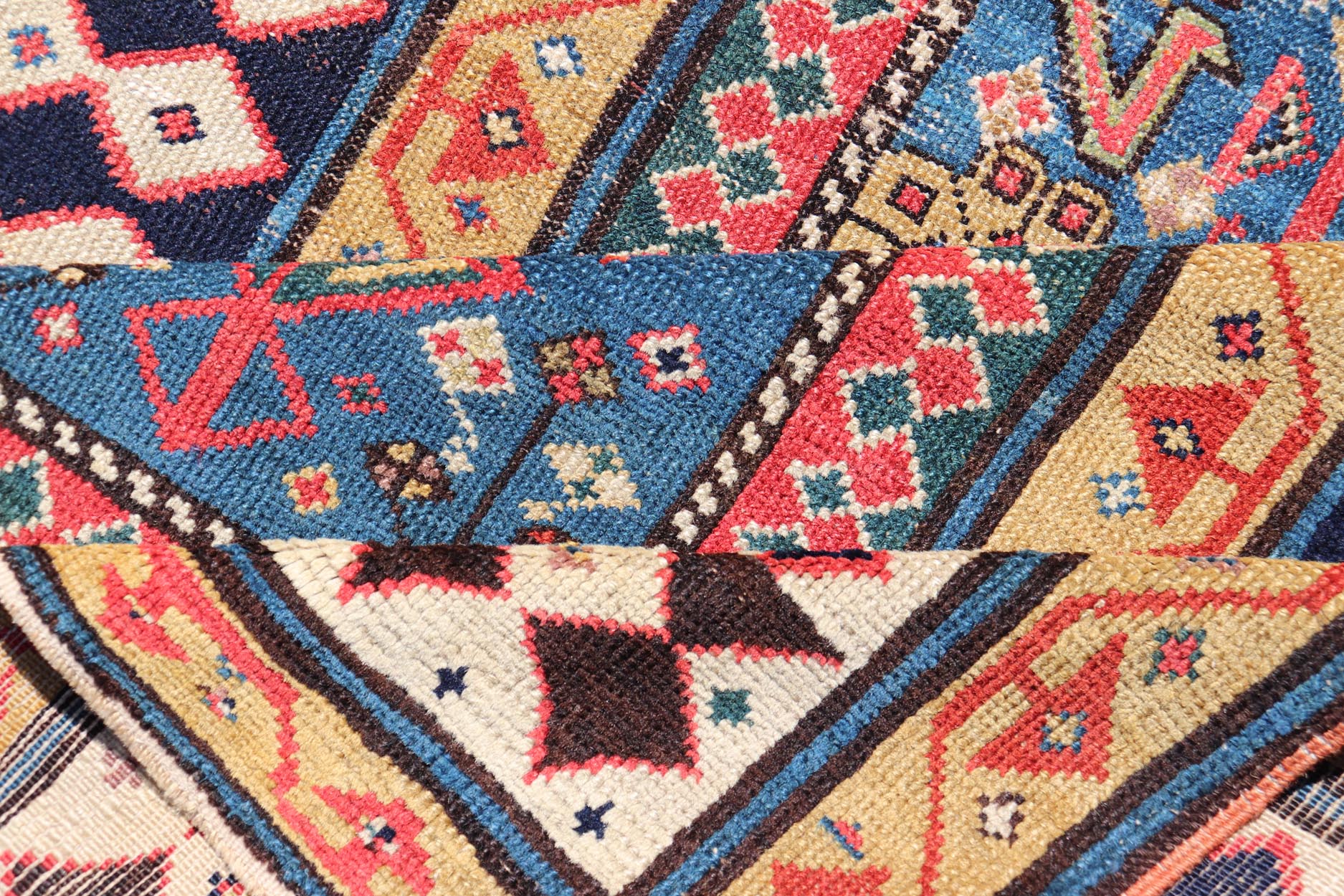 Antique Caucasian Shirvan Rug with Tribal Design and Motifs in Vivid Colors. Keivan Woven Arts / rug X23 - 0810 - 55, country of origin / type: Caucasus / Shirvan, circa 1875. Measures: 3'9 x 7'10 A finely woven Shirvan Caucasian rug. The field desi... - Keivan Woven ArtsX23 - 0810 - 55 - 24849Rug