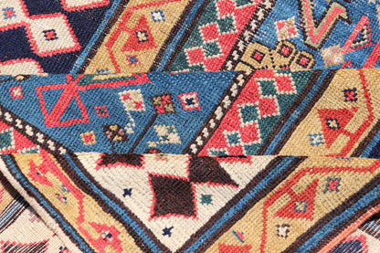 Antique Caucasian Shirvan Rug with Tribal Design and Motifs in Vivid Colors. Keivan Woven Arts / rug X23 - 0810 - 55, country of origin / type: Caucasus / Shirvan, circa 1875. Measures: 3'9 x 7'10 A finely woven Shirvan Caucasian rug. The field desi... - Keivan Woven ArtsX23 - 0810 - 55 - 24849Rug
