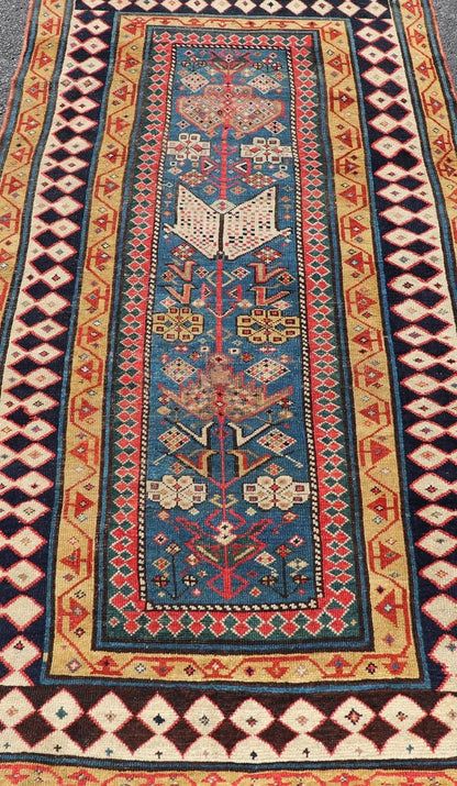 Antique Caucasian Shirvan Rug with Tribal Design and Motifs in Vivid Colors. Keivan Woven Arts / rug X23 - 0810 - 55, country of origin / type: Caucasus / Shirvan, circa 1875. Measures: 3'9 x 7'10 A finely woven Shirvan Caucasian rug. The field desi... - Keivan Woven ArtsX23 - 0810 - 55 - 24849Rug