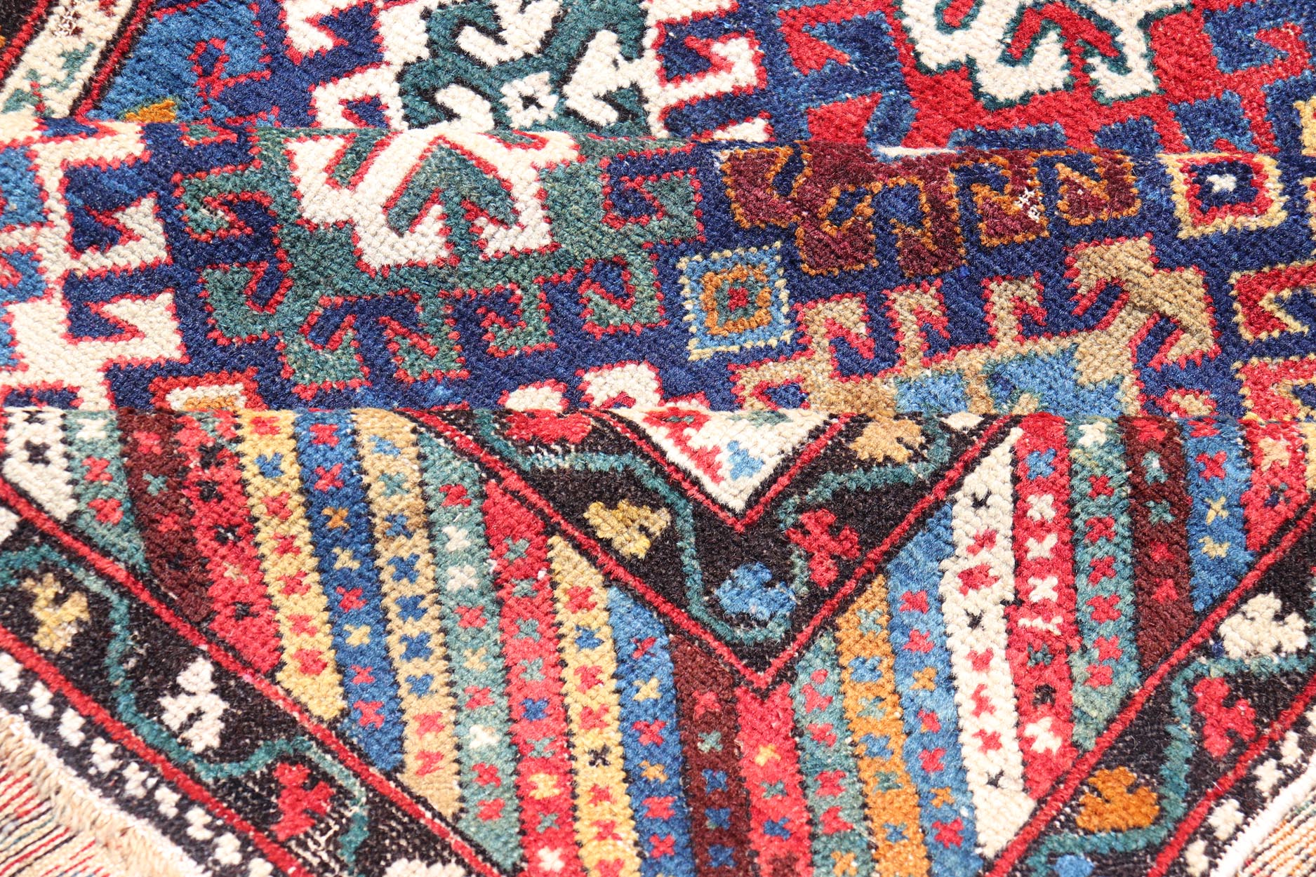 Antique Caucasian Kuba Gallery Runner with Tribal Design and All - Over Motifs. Keivan Woven Arts / rug X23 - 0811 - 79, country of origin / type: Caucasus / Shirvan, circa 1890. Measures: 4'0 x 10'6 The field design of this antique Caucasian Kuba ga... - Keivan Woven ArtsX23 - 0811 - 79 - 24855Rug