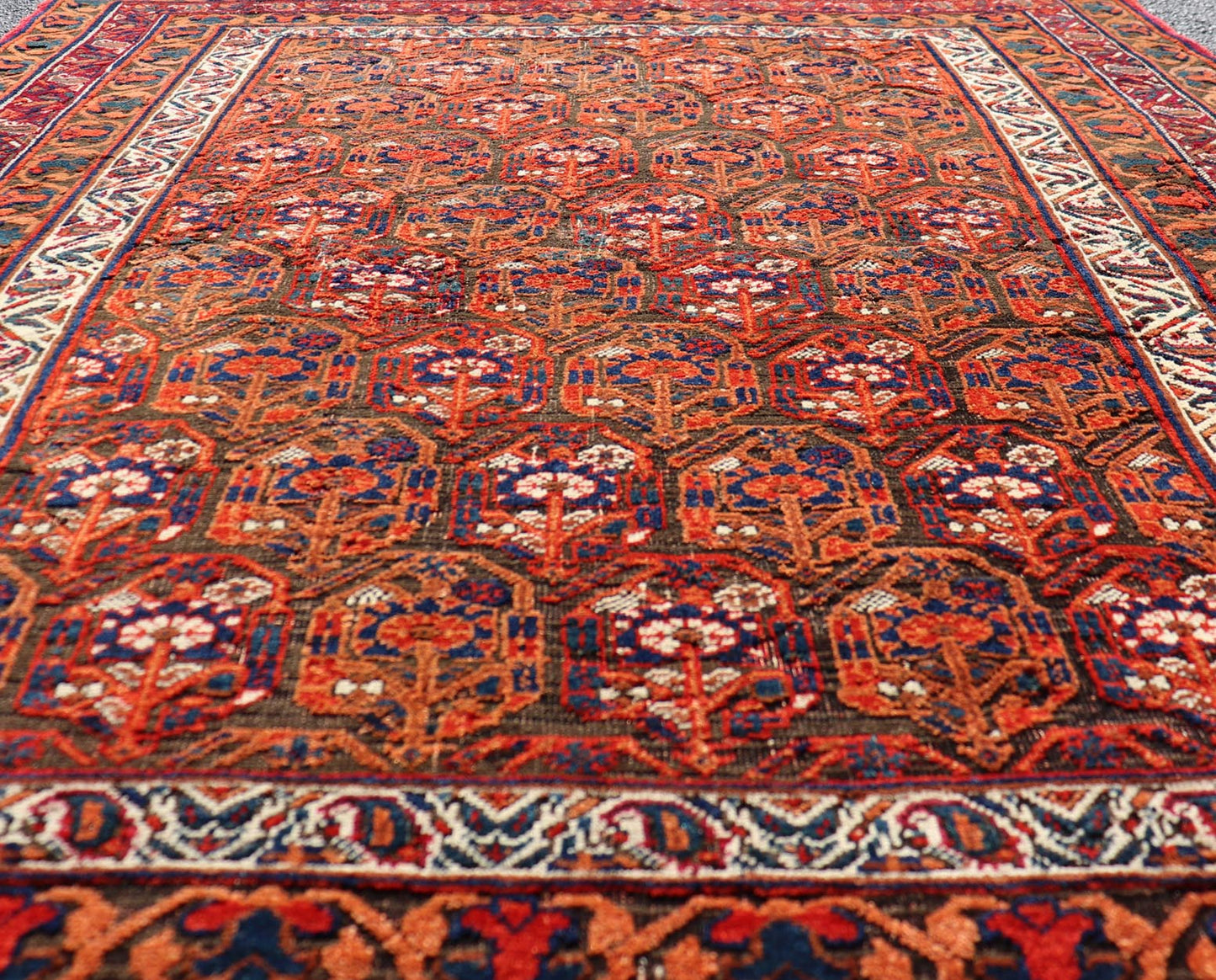 Fine Persian Antique Afshar Rug in Orange and Copper Background & Multi Colors. Keivan Woven Arts/ Rug/X23 - 0812 - 93, Antique Afshar Early 20th Century. Measures: 4'2 x 5'2 Unique Botanical, rich symbolism, and fine intricacy contribute to the ma... - Keivan Woven ArtsX23 - 0812 - 93 - 24813