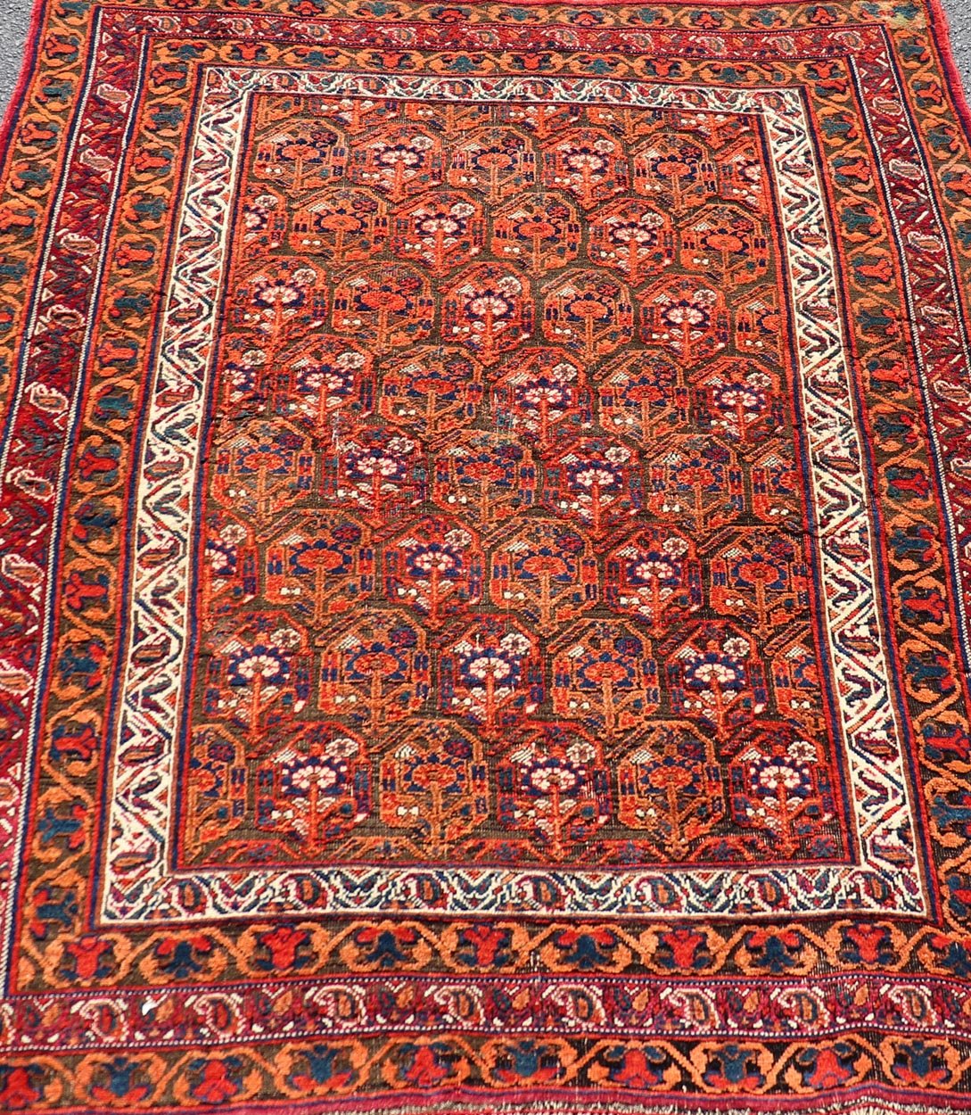 Fine Persian Antique Afshar Rug in Orange and Copper Background & Multi Colors. Keivan Woven Arts/ Rug/X23 - 0812 - 93, Antique Afshar Early 20th Century. Measures: 4'2 x 5'2 Unique Botanical, rich symbolism, and fine intricacy contribute to the ma... - Keivan Woven ArtsX23 - 0812 - 93 - 24813