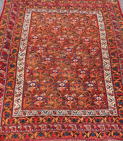 Fine Persian Antique Afshar Rug in Orange and Copper Background & Multi Colors. Keivan Woven Arts/ Rug/X23 - 0812 - 93, Antique Afshar Early 20th Century. Measures: 4'2 x 5'2 Unique Botanical, rich symbolism, and fine intricacy contribute to the ma... - Keivan Woven ArtsX23 - 0812 - 93 - 24813