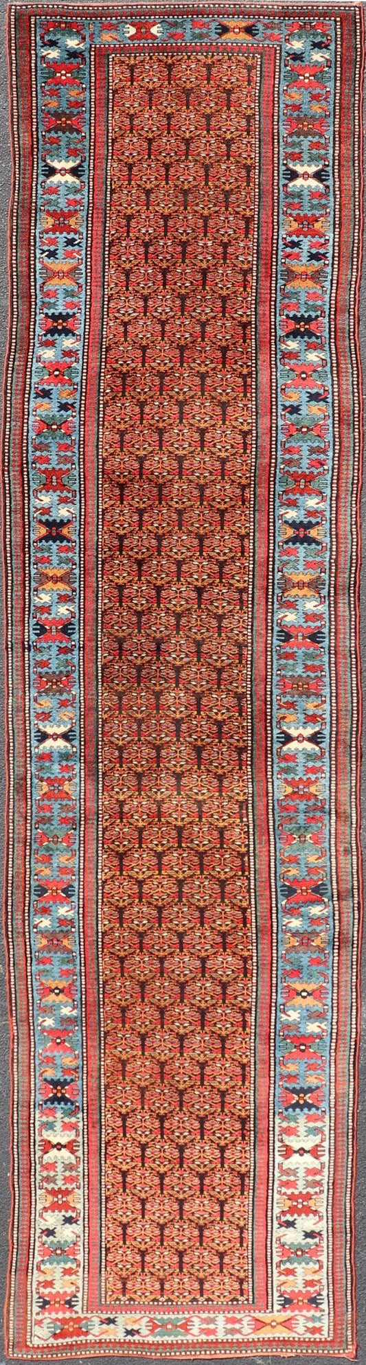 Antique Persian Kurdish Long Gallery Runner with Repeating Tribal Motif Design. Keivan Woven Arts; rug X23 - 0816 - 335; country of origin / type: Persian / Kurdish circa 1900. Measures: 3'5 x 14'9 This antique hand - knotted Persian Kurdish wide runn... - Keivan Woven ArtsX23 - 0816 - 335 - 24862Rug