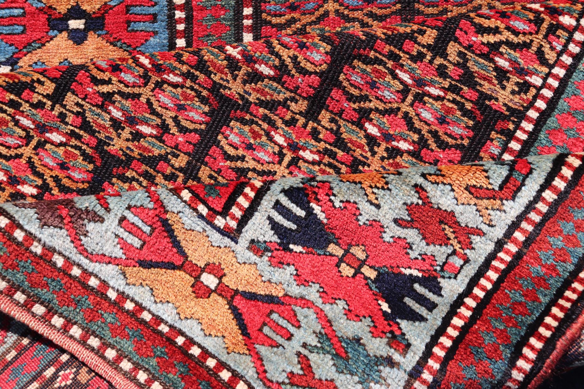 Antique Persian Kurdish Long Gallery Runner with Repeating Tribal Motif Design. Keivan Woven Arts; rug X23 - 0816 - 335; country of origin / type: Persian / Kurdish circa 1900. Measures: 3'5 x 14'9 This antique hand - knotted Persian Kurdish wide runn... - Keivan Woven ArtsX23 - 0816 - 335 - 24862Rug