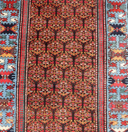 Antique Persian Kurdish Long Gallery Runner with Repeating Tribal Motif Design. Keivan Woven Arts; rug X23 - 0816 - 335; country of origin / type: Persian / Kurdish circa 1900. Measures: 3'5 x 14'9 This antique hand - knotted Persian Kurdish wide runn... - Keivan Woven ArtsX23 - 0816 - 335 - 24862Rug