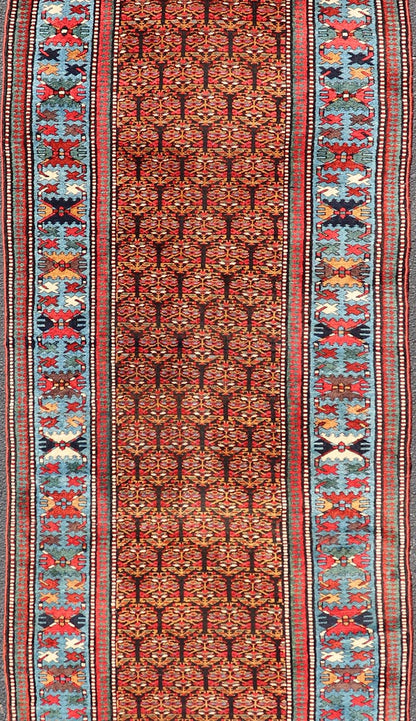 Antique Persian Kurdish Long Gallery Runner with Repeating Tribal Motif Design. Keivan Woven Arts; rug X23 - 0816 - 335; country of origin / type: Persian / Kurdish circa 1900. Measures: 3'5 x 14'9 This antique hand - knotted Persian Kurdish wide runn... - Keivan Woven ArtsX23 - 0816 - 335 - 24862Rug