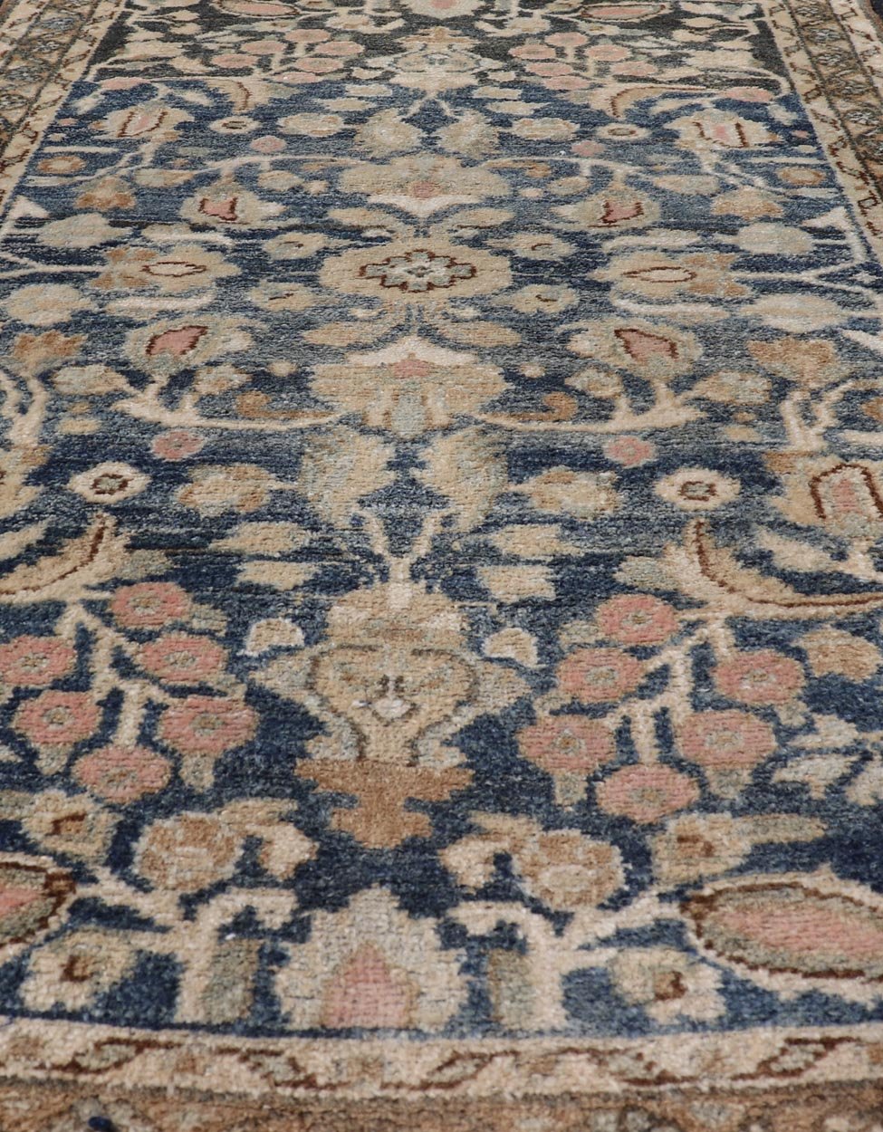 Measures: 2'3 x 3'9 Blue Oriental Floral Area Rug with Beige and Blue by Keivan Woven Arts. Rug/ X23 - 1107 / Iran, early 20th Century, hand knotted rug. This image depicts a beautiful rectangular area rug featuring a traditional oriental design.... - Keivan Woven ArtsX23 - 1107 - 27397Rug