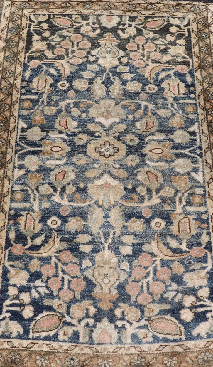 Measures: 2'3 x 3'9 Blue Oriental Floral Area Rug with Beige and Blue by Keivan Woven Arts. Rug/ X23 - 1107 / Iran, early 20th Century, hand knotted rug. This image depicts a beautiful rectangular area rug featuring a traditional oriental design.... - Keivan Woven ArtsX23 - 1107 - 27397Rug