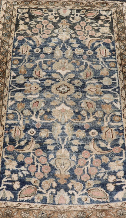 Measures: 2'3 x 3'9 Blue Oriental Floral Area Rug with Beige and Blue by Keivan Woven Arts. Rug/ X23 - 1107 / Iran, early 20th Century, hand knotted rug. This image depicts a beautiful rectangular area rug featuring a traditional oriental design.... - Keivan Woven ArtsX23 - 1107 - 27397Rug