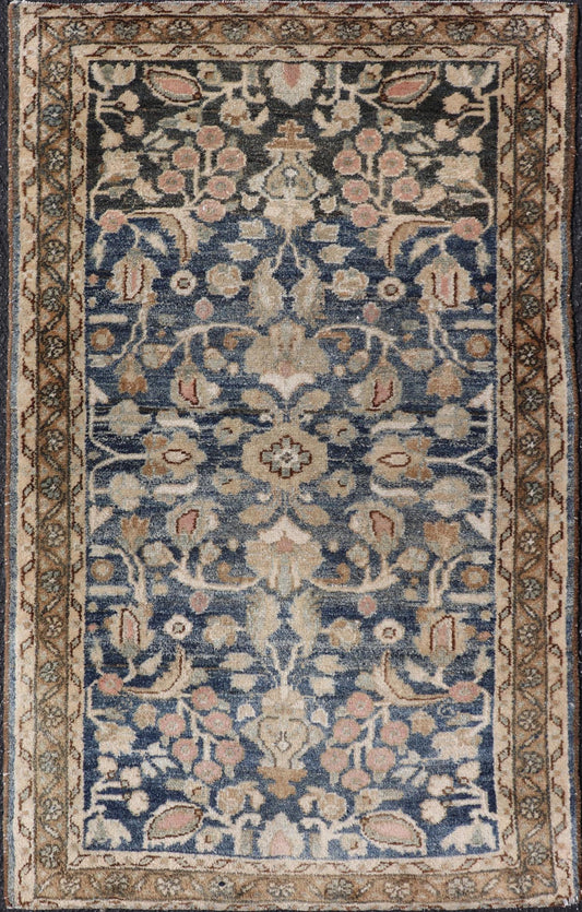 Measures: 2'3 x 3'9 Blue Oriental Floral Area Rug with Beige and Blue by Keivan Woven Arts. Rug/ X23 - 1107 / Iran, early 20th Century, hand knotted rug. This image depicts a beautiful rectangular area rug featuring a traditional oriental design.... - Keivan Woven ArtsX23 - 1107 - 27397Rug