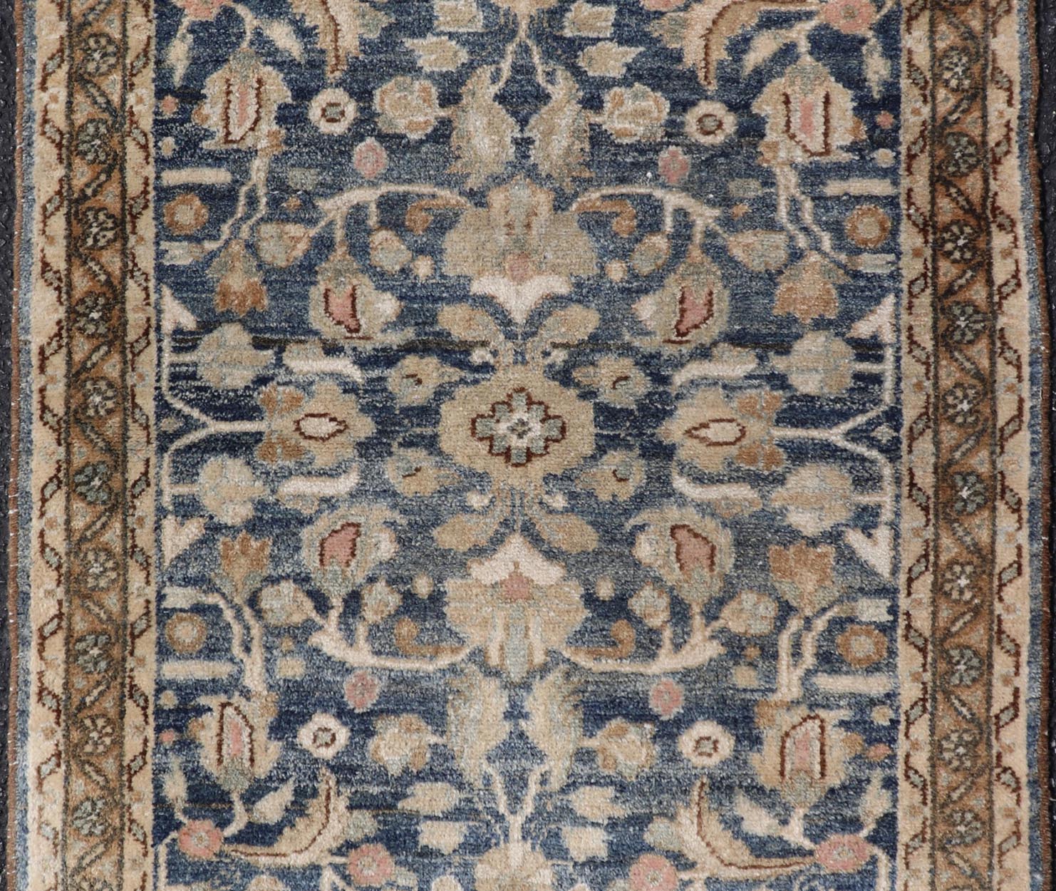 Measures: 2'3 x 3'9 Blue Oriental Floral Area Rug with Beige and Blue by Keivan Woven Arts. Rug/ X23 - 1107 / Iran, early 20th Century, hand knotted rug. This image depicts a beautiful rectangular area rug featuring a traditional oriental design.... - Keivan Woven ArtsX23 - 1107 - 27397Rug
