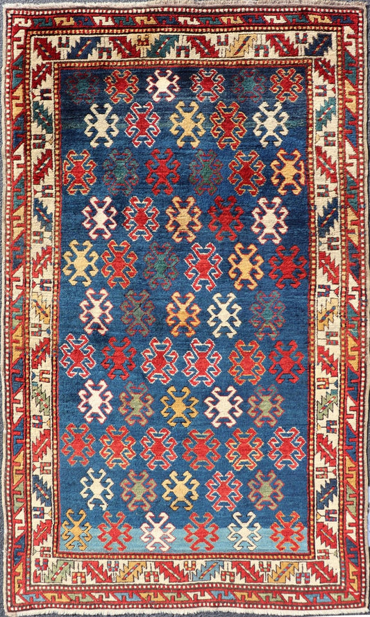 Antique Caucasian Kazak Rug with Geometric And Tribal Motifs Keivan Woven Arts. Keivan Woven Arts / rug /X23 - 1201 - 169, country of origin / type: Caucasus / Kazak, circa 1875. Measures: 4'3 x 7'6 This late 19th - century treasure is rendered in bl... - Keivan Woven ArtsX23 - 1201 - 169 - 25619Rugs