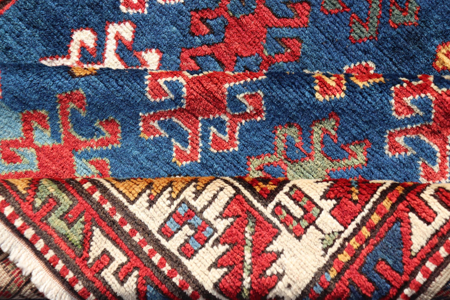 Antique Caucasian Kazak Rug with Geometric And Tribal Motifs Keivan Woven Arts. Keivan Woven Arts / rug /X23 - 1201 - 169, country of origin / type: Caucasus / Kazak, circa 1875. Measures: 4'3 x 7'6 This late 19th - century treasure is rendered in bl... - Keivan Woven ArtsX23 - 1201 - 169 - 25619Rugs