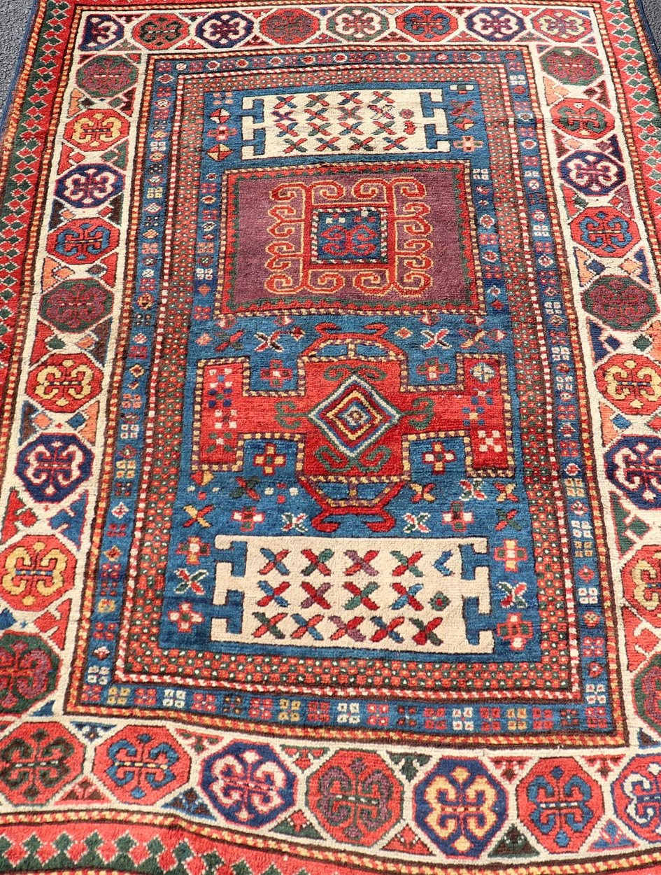 Antique Caucasian Kazak Rug with Geometrics Medallions Keivan Woven Arts. Keivan Woven Arts / rug X23 - 1204 - 188, country of origin / type: Caucasus late 19th Century. Measures: 4'4 x 7'0 Kazak rugs are among the most desirable Caucasian rugs. Th... - Keivan Woven ArtsX23 - 1204 - 188 - 25627Rugs