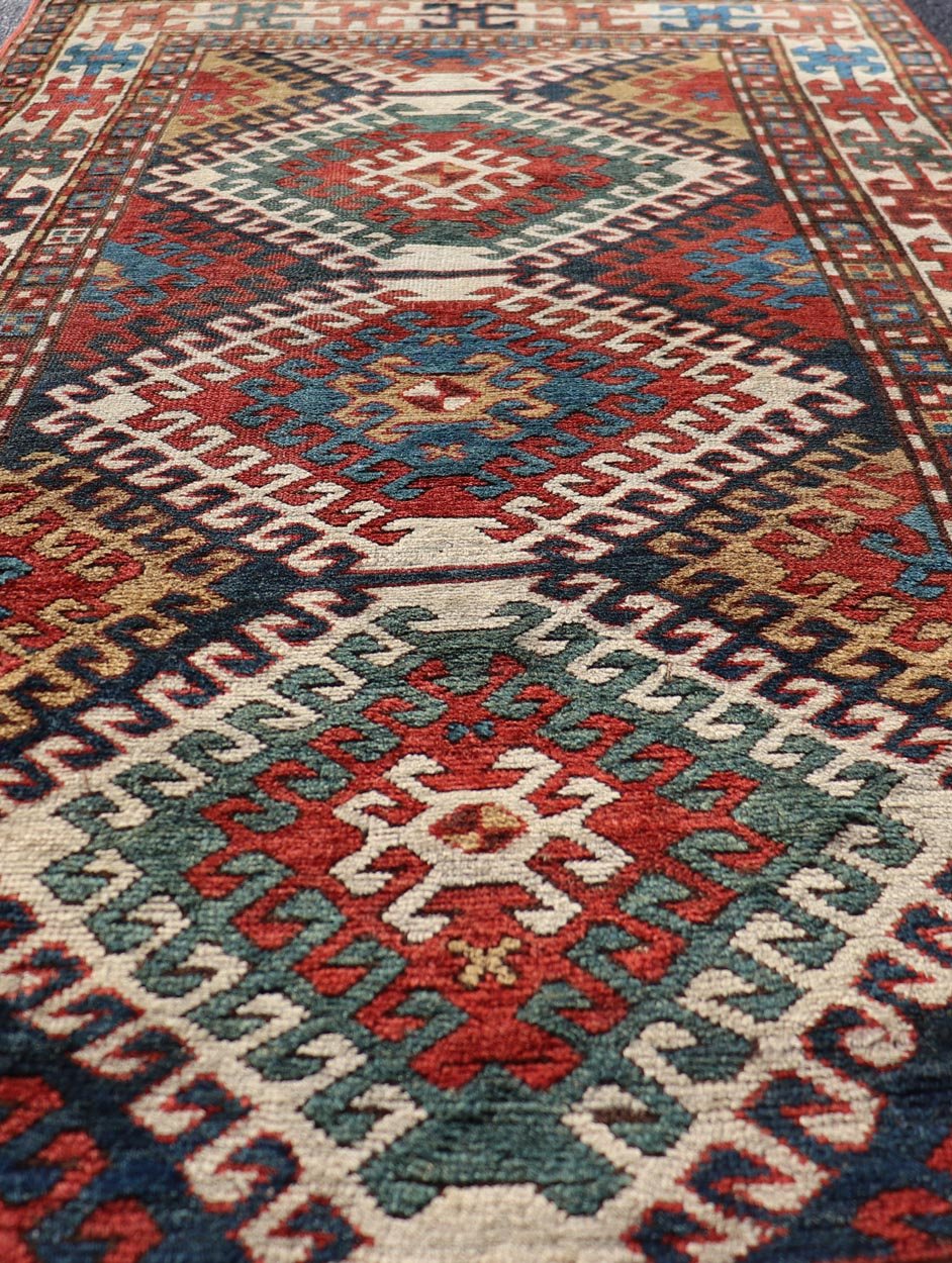 Antique Caucasian Kazak Rug With Geometric Design Medallion's Keivan Woven Arts. Keivan Woven Arts / rug X23 - 1205 - 197, country of origin / type: Caucuses / Caucasian Kazak, circa 1880. Measures: 3'10 x 7'4 Brilliant Kazak rugs are among the most... - Keivan Woven ArtsX23 - 1205 - 197 - 25633Rugs
