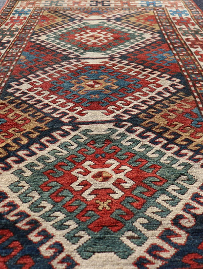 Antique Caucasian Kazak Rug With Geometric Design Medallion's Keivan Woven Arts. Keivan Woven Arts / rug X23 - 1205 - 197, country of origin / type: Caucuses / Caucasian Kazak, circa 1880. Measures: 3'10 x 7'4 Brilliant Kazak rugs are among the most... - Keivan Woven ArtsX23 - 1205 - 197 - 25633Rugs