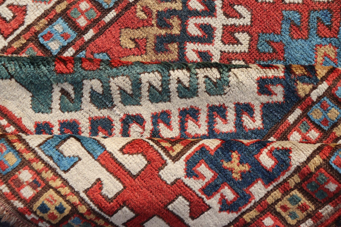 Antique Caucasian Kazak Rug With Geometric Design Medallion's Keivan Woven Arts. Keivan Woven Arts / rug X23 - 1205 - 197, country of origin / type: Caucuses / Caucasian Kazak, circa 1880. Measures: 3'10 x 7'4 Brilliant Kazak rugs are among the most... - Keivan Woven ArtsX23 - 1205 - 197 - 25633Rugs