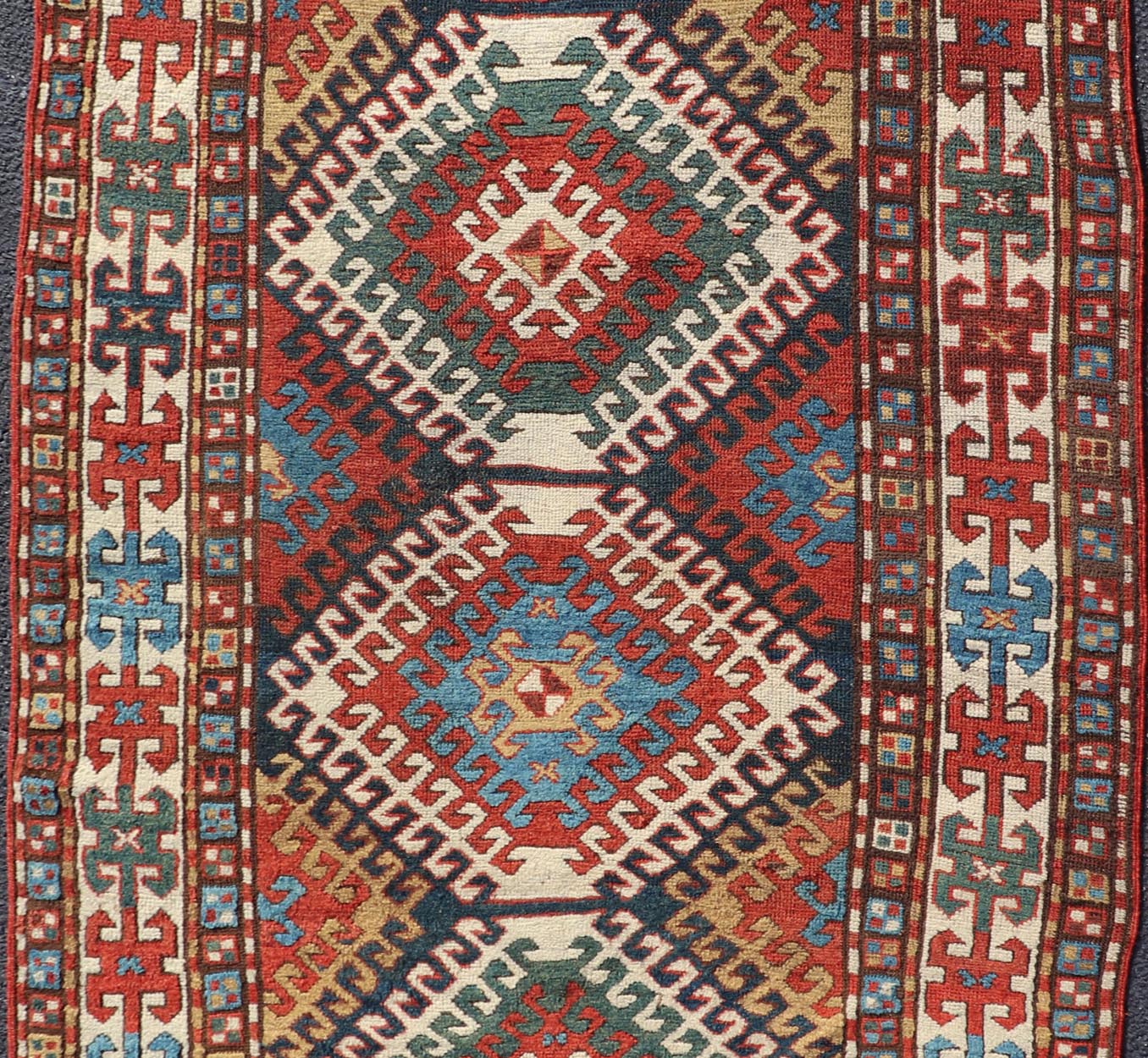 Antique Caucasian Kazak Rug With Geometric Design Medallion's Keivan Woven Arts. Keivan Woven Arts / rug X23 - 1205 - 197, country of origin / type: Caucuses / Caucasian Kazak, circa 1880. Measures: 3'10 x 7'4 Brilliant Kazak rugs are among the most... - Keivan Woven ArtsX23 - 1205 - 197 - 25633Rugs