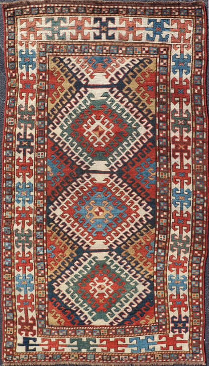 Antique Caucasian Kazak Rug With Geometric Design Medallion's Keivan Woven Arts. Keivan Woven Arts / rug X23 - 1205 - 197, country of origin / type: Caucuses / Caucasian Kazak, circa 1880. Measures: 3'10 x 7'4 Brilliant Kazak rugs are among the most... - Keivan Woven ArtsX23 - 1205 - 197 - 25633Rugs