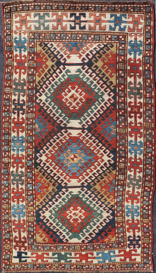 Antique Caucasian Kazak Rug With Geometric Design Medallion's Keivan Woven Arts. Keivan Woven Arts / rug X23 - 1205 - 197, country of origin / type: Caucuses / Caucasian Kazak, circa 1880. Measures: 3'10 x 7'4 Brilliant Kazak rugs are among the most... - Keivan Woven ArtsX23 - 1205 - 197 - 25633Rugs