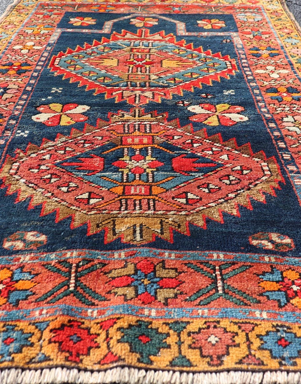 N.W. Persian Rug with Geometric Medallion with Florals Keivan Woven Arts. Keivan Woven Arts / X23 - 1210 - 344, country of origin / type: Iran / N.W. Persian, circa 1900. Measures: 2'10 x 4'6 The elegant medallion design in the field consists of... - Keivan Woven ArtsX23 - 1210 - 344 - 25653Rugs
