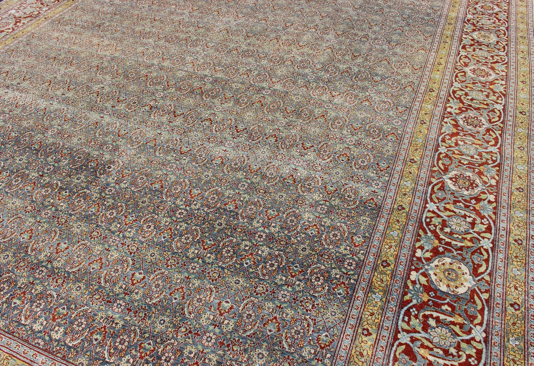 Red, border with gray, and blue Persian Tabriz antique rug in sub geometric design. keivan Woven Arts / rug zir - 1, country of origin / type: Iran / Tabriz, circa 1910. Measures: 13'6 x 16'2. This antique Persian Tabriz carpet (circa early 20th c... - Keivan Woven ArtsZIR - 1 - 9368Rug