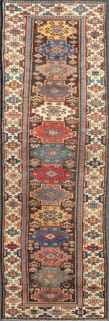 Northwest Persian antique runner with geometric design in multicolored tones, rug zir - 12, country of origin / type: Iran / N.W. Persian Tribal, circa 1900. This jewel - toned antique N.W. Persian rug, circa 1900, features a unique blend of colors ... - Keivan Woven ArtsZIR - 12 - 9396Rug