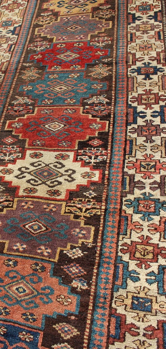 Northwest Persian antique runner with geometric design in multicolored tones, rug zir - 12, country of origin / type: Iran / N.W. Persian Tribal, circa 1900. This jewel - toned antique N.W. Persian rug, circa 1900, features a unique blend of colors ... - Keivan Woven ArtsZIR - 12 - 9396