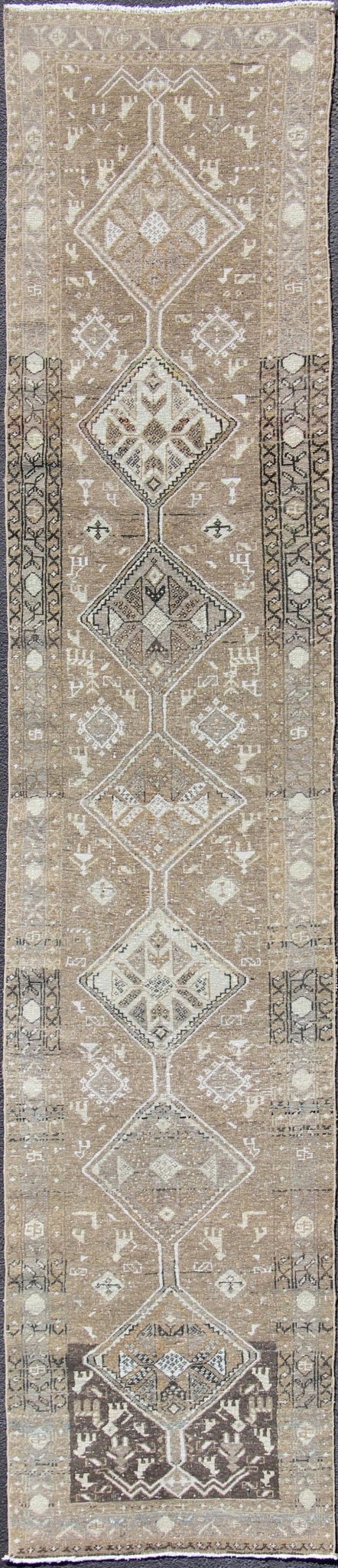 Tribal diamond medallion antique Heriz runner Persian in taupe, camel, brown, rug zir - 20, country of origin / type: Iran / Heriz, circa 1910 This antique Persian Heriz gallery rug, circa early 20th century, features a unique blend of colors and ... - Keivan Woven ArtsZIR - 20 - 10090