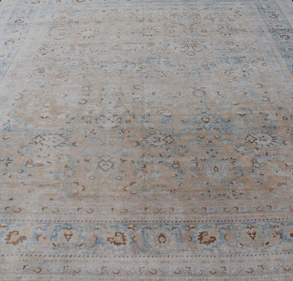 Persian distressed Antique Mashhad Carpet with Muted Floral and Medallion Design. Antique distressed Persian Mashhad carpet with tan and blue floral and medallion design, / ZIR - 51 - KV - 10. Persian Mashhad floral design. This outstanding mu... - Keivan Woven ArtsZIR - 51 - KV - 10 - 14994Rug