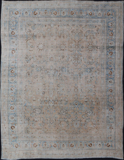 Persian distressed Antique Mashhad Carpet with Muted Floral and Medallion Design. Antique distressed Persian Mashhad carpet with tan and blue floral and medallion design, / ZIR - 51 - KV - 10. Persian Mashhad floral design. This outstanding mu... - Keivan Woven ArtsZIR - 51 - KV - 10 - 14994Rug