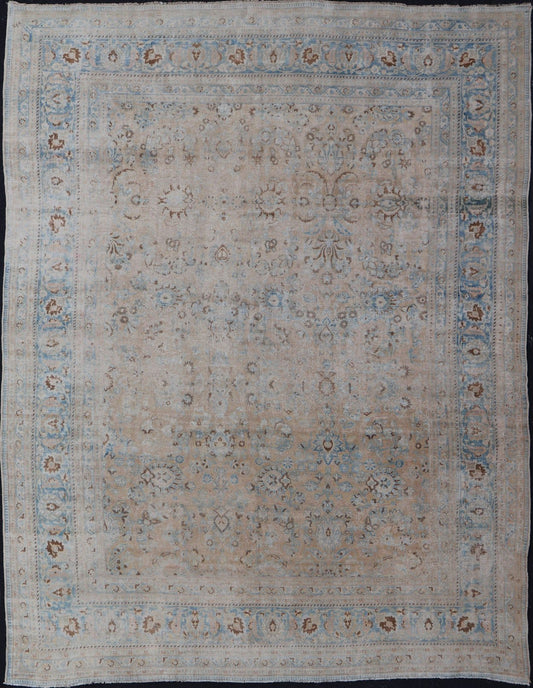 Persian distressed Antique Mashhad Carpet with Muted Floral and Medallion Design. Antique distressed Persian Mashhad carpet with tan and blue floral and medallion design, / ZIR - 51 - KV - 10. Persian Mashhad floral design. This outstanding mu... - Keivan Woven ArtsZIR - 51 - KV - 10 - 14994Rug