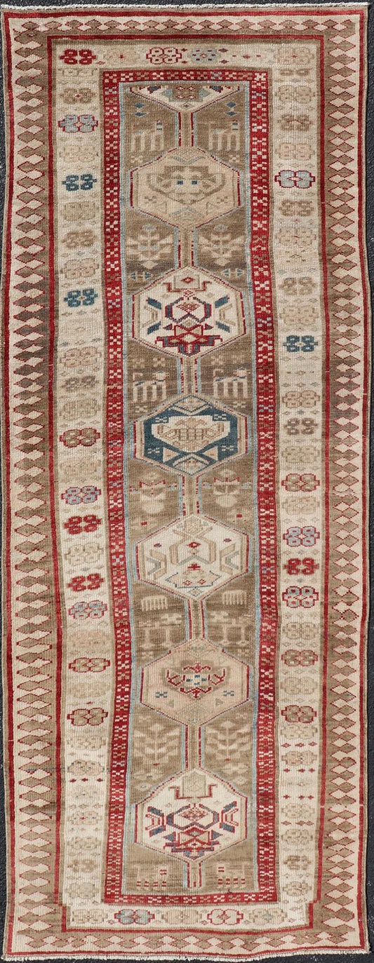 Persian Hand Knotted Antique Serab Runner in Tribal Design With Medallions. Antique Persian Tribal Serab runner, Keivan Woven Arts / rug/ ZIR - 59 - KV - 05, origin/iran 1900 Measures: 3'0 x 8'10 This antique Serab carpet from 1900s Persia features a ... - Keivan Woven ArtsZIR - 59 - KV - 05 - 15018