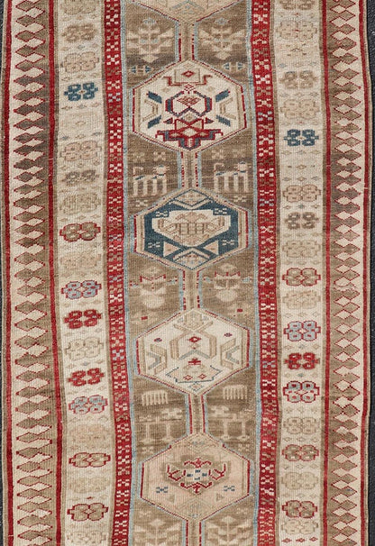 Persian Hand Knotted Antique Serab Runner in Tribal Design With Medallions. Antique Persian Tribal Serab runner, Keivan Woven Arts / rug/ ZIR - 59 - KV - 05, origin/iran 1900 Measures: 3'0 x 8'10 This antique Serab carpet from 1900s Persia features a ... - Keivan Woven ArtsZIR - 59 - KV - 05 - 15018